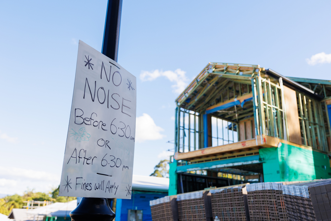 Sign threatening fines if construction noise occurs before 06:30 or after 18:30